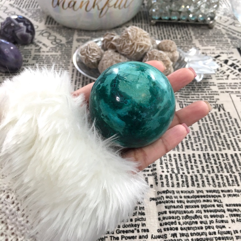 Solid Chrysocolla Sphere with metal stand.